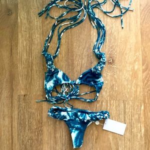 Mikoh extra small extra small two piece. Never worn with tags. Looks tiny.